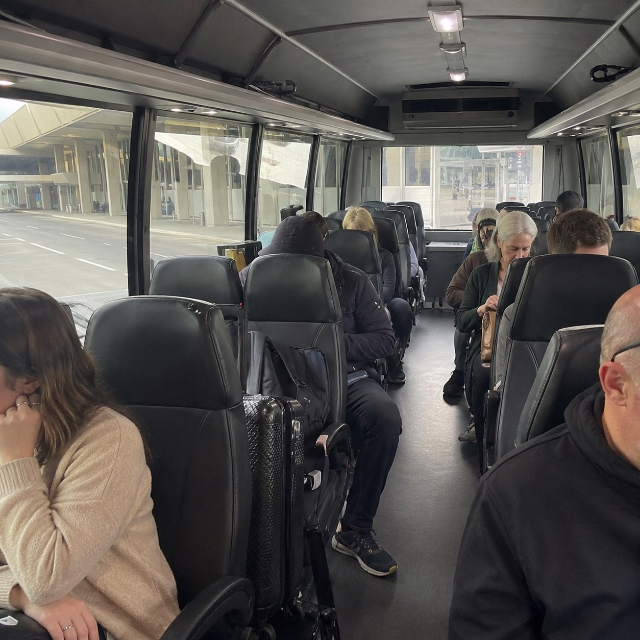 Airport transportation airport transportation minibus interior passengers at airport in Hampton Roads