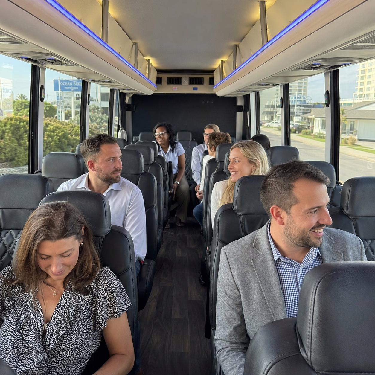 Corporate event party bus corporate event transportation minibus interior passengers corporate trip in Hampton Roads