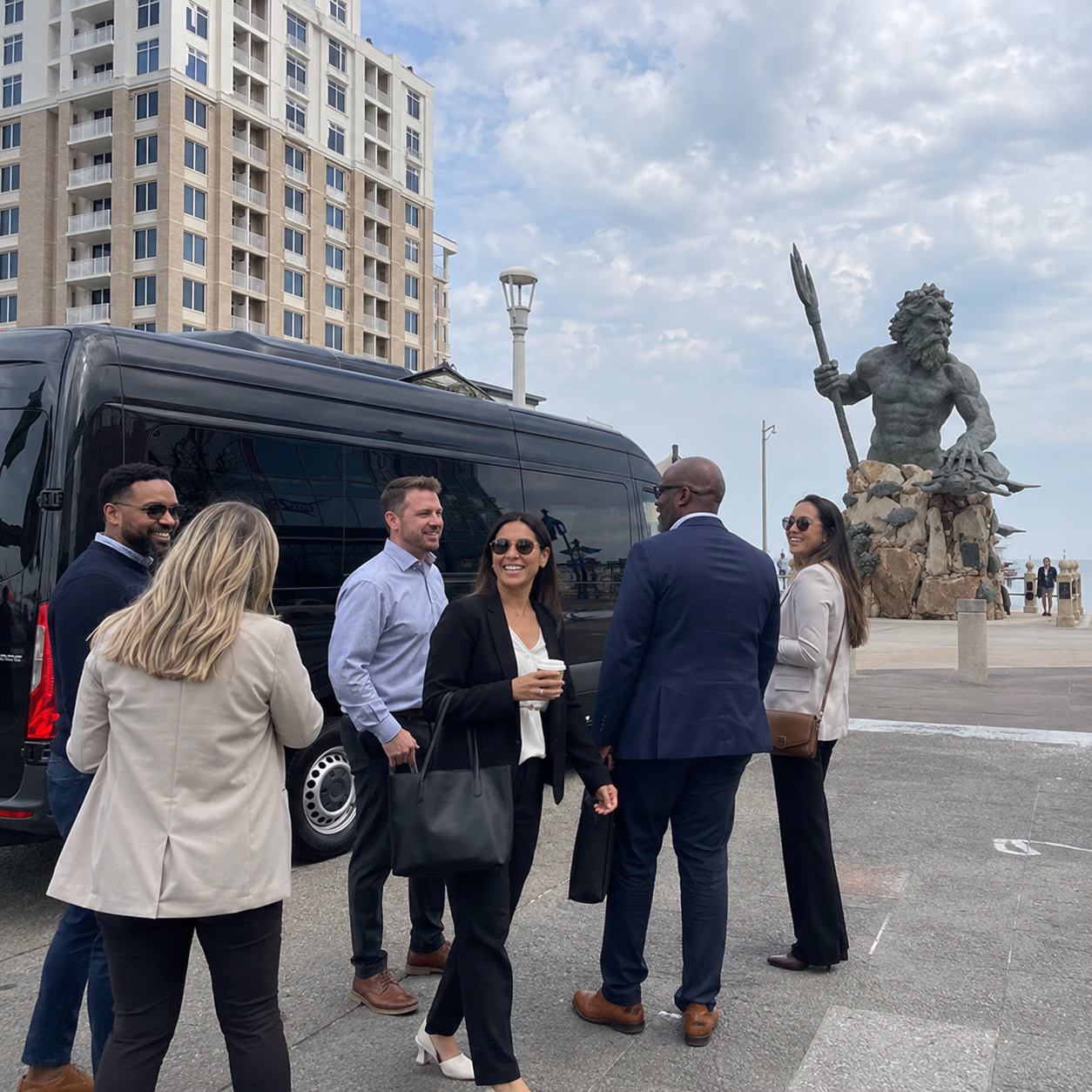 Corporate event party bus corporate event transportation sprinter van exterior group corporate trip 2 in Hampton Roads