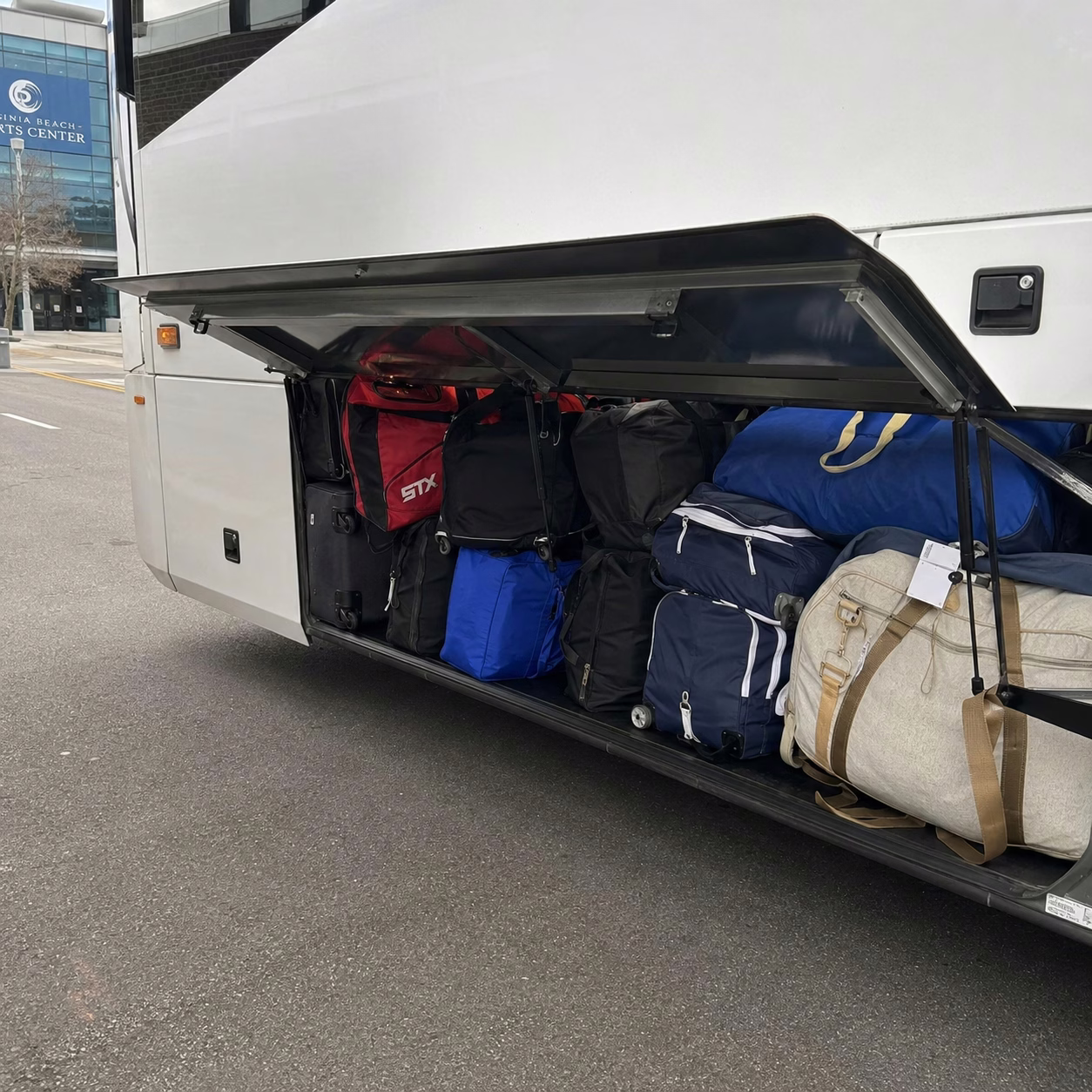Sporting event party bus sporting event bus charter bus luggage bay in Hampton Roads
