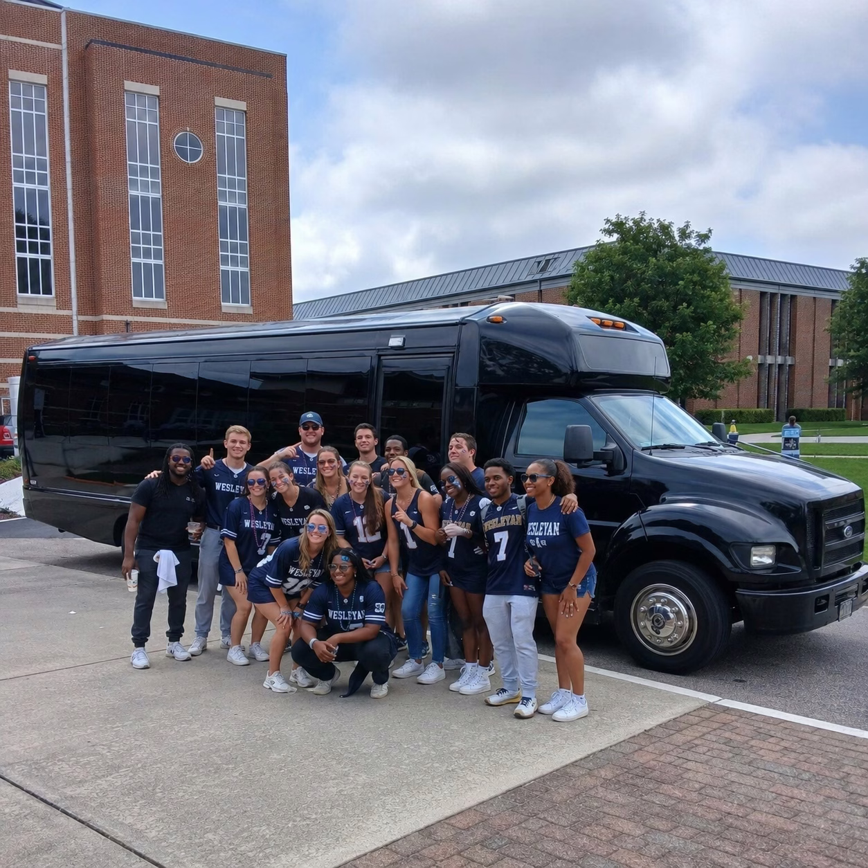 Sporting event party bus sporting event bus party bus exterior group campus visit in Hampton Roads