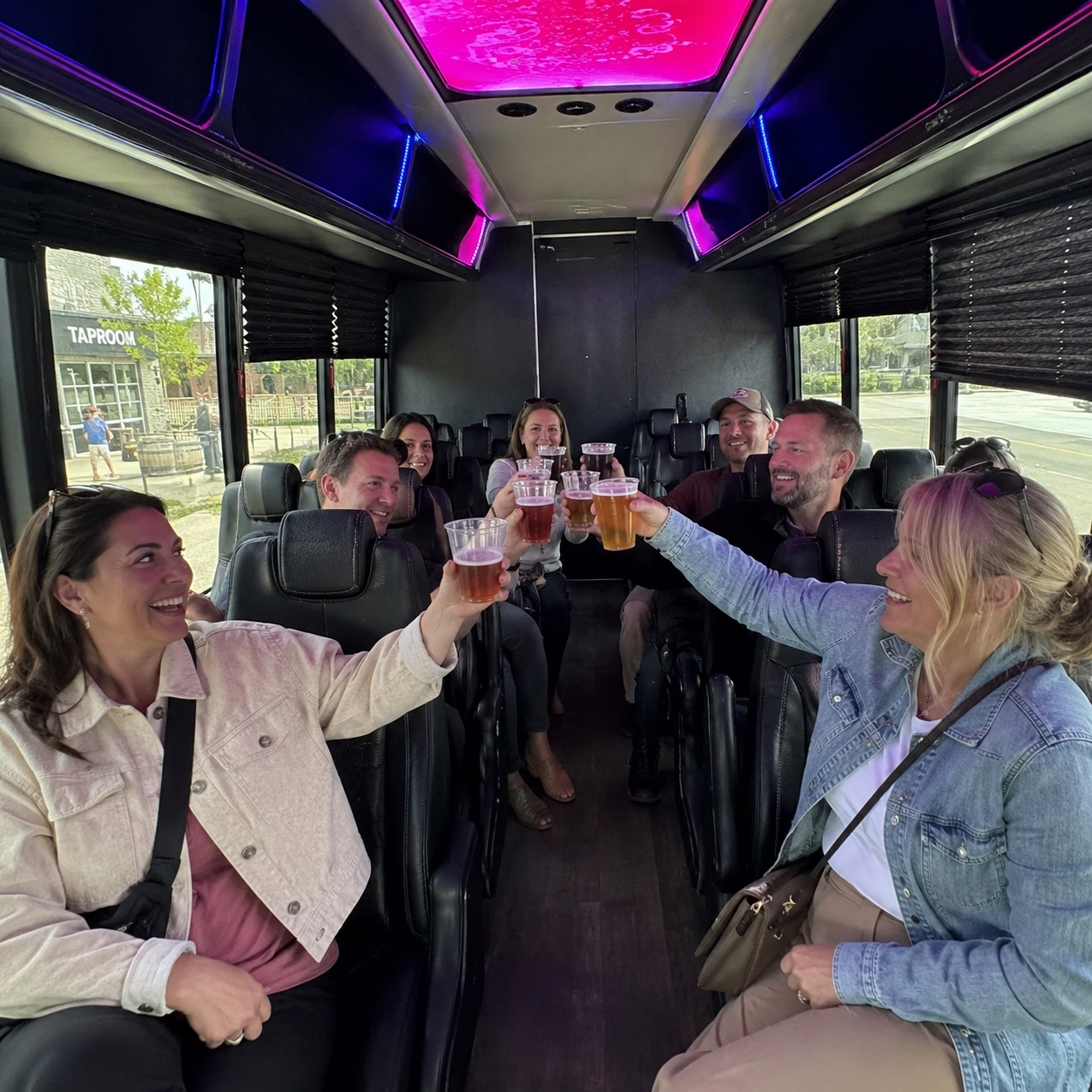 Winery tour pub crawl party bus winery tour party bus minibus interior passengers brewery stop in Hampton Roads